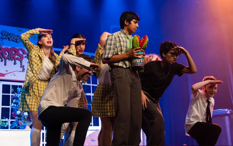 Students performing in the school musical