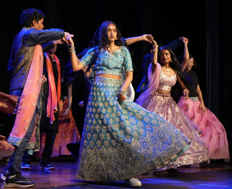 Student performers in cultural dress
